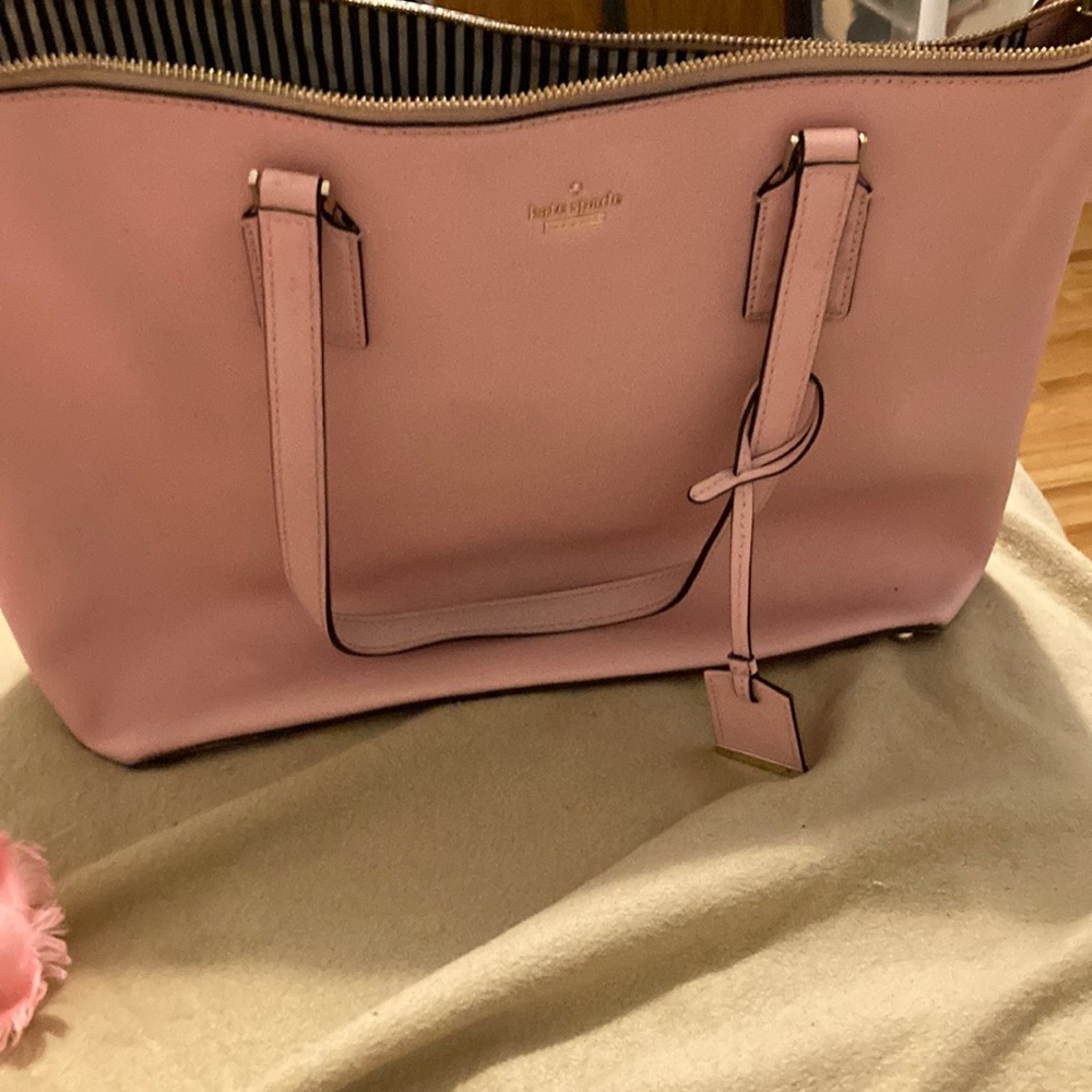 A pink Kate spade purse